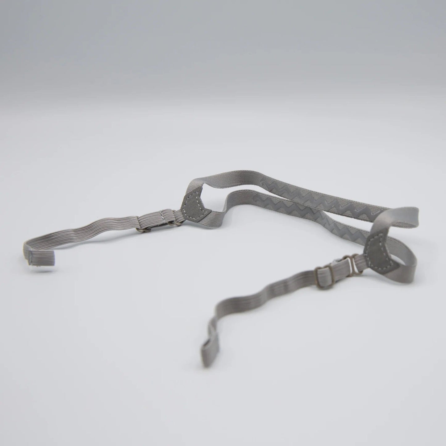 Picture of the grey halo strap on a grey background.